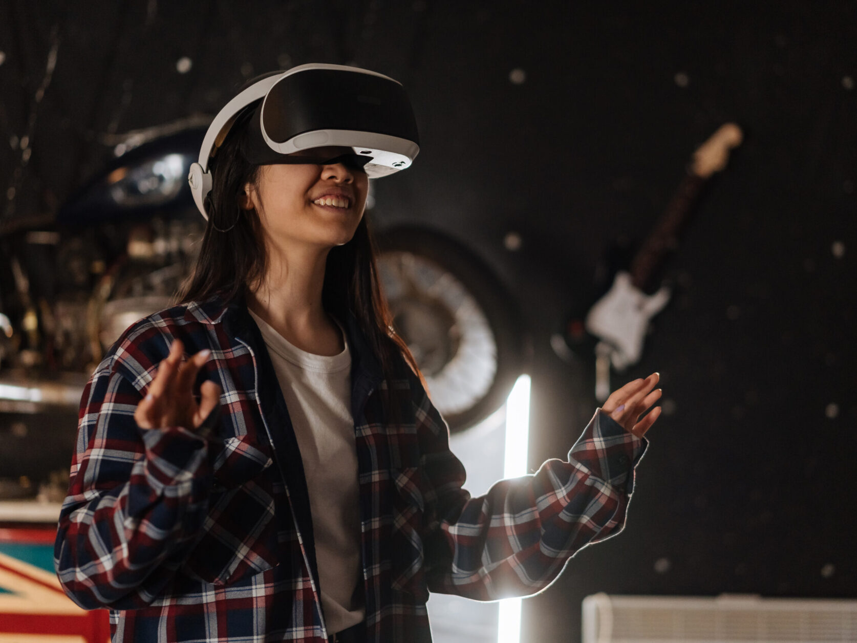 Happy Woman using Virtual Reality Goggles